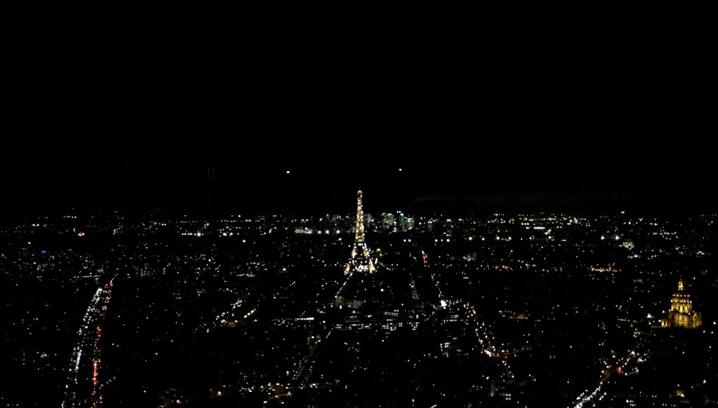 View of Paris at night from Montparnasse Tower